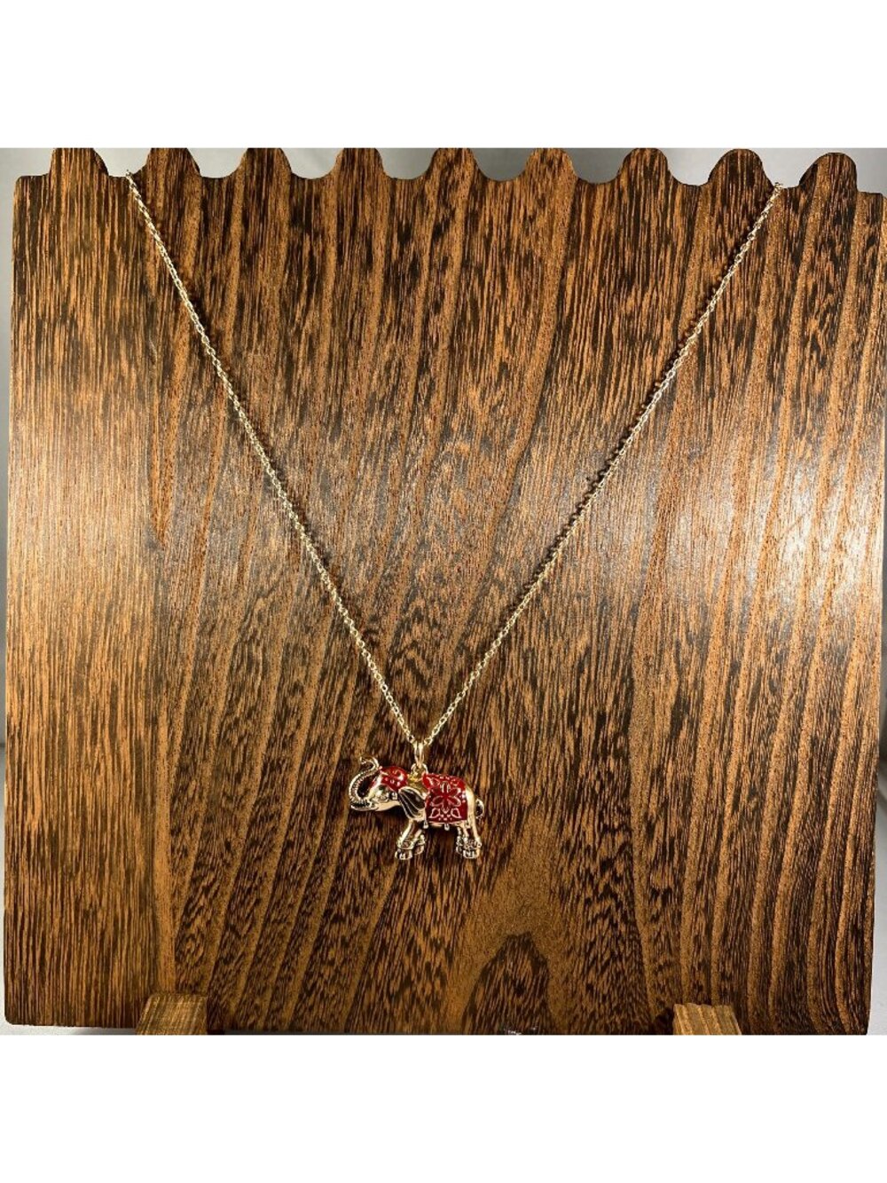Gold-Tone Elephant Pendant Necklace With Red Enamel Detailing & Floral Motif On